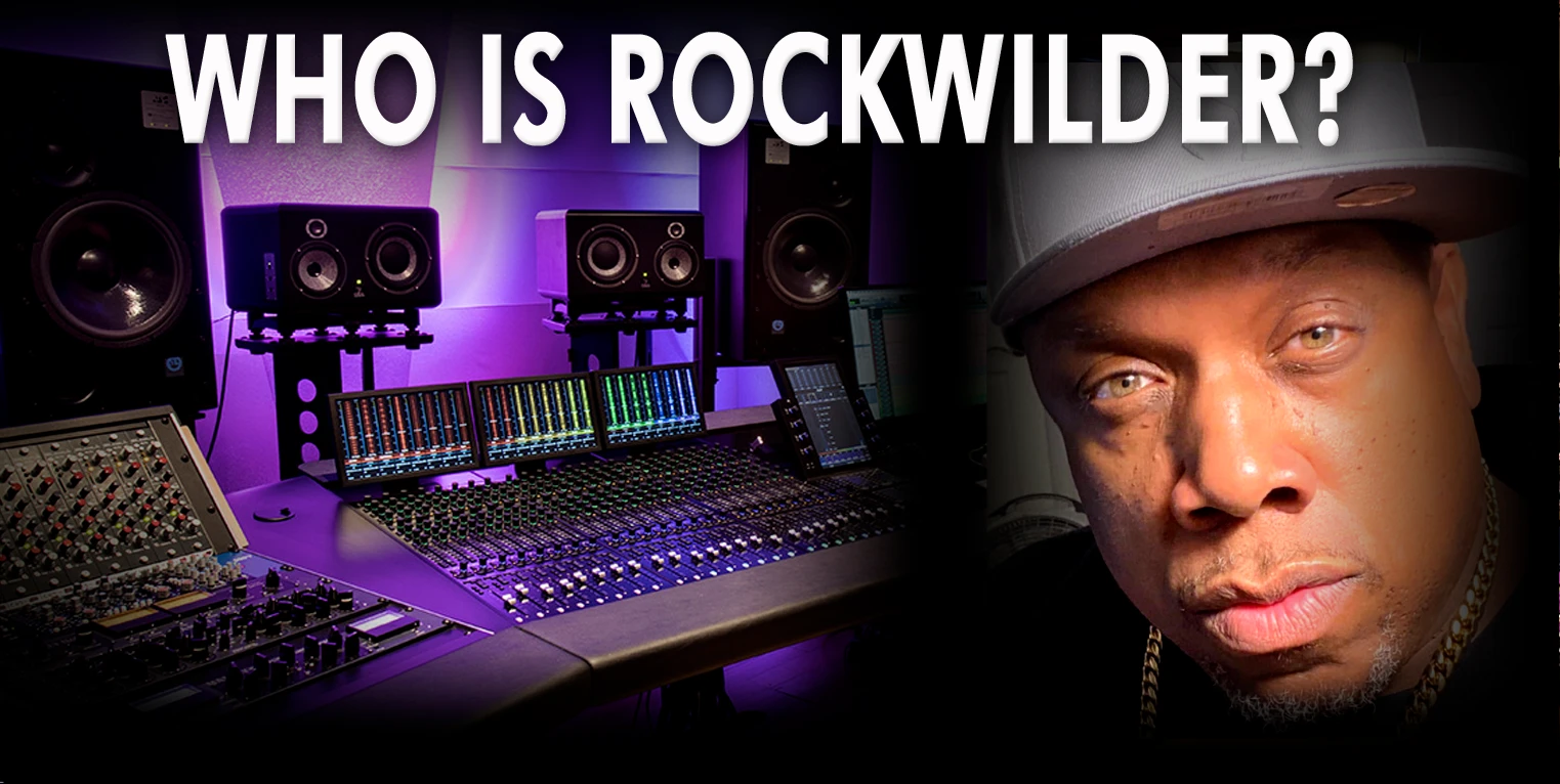 Who is Rockwilder? Rockwilder beside a studio mixing console